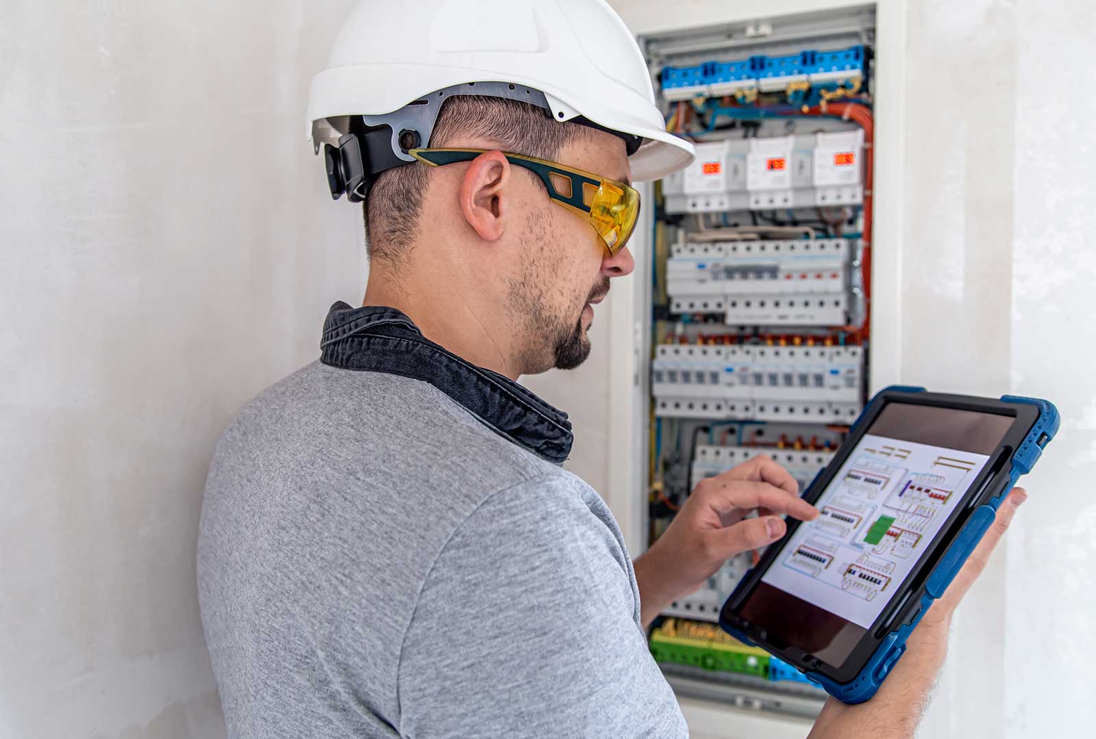 Solar Inspections Electrician Inspecting Distribution Board